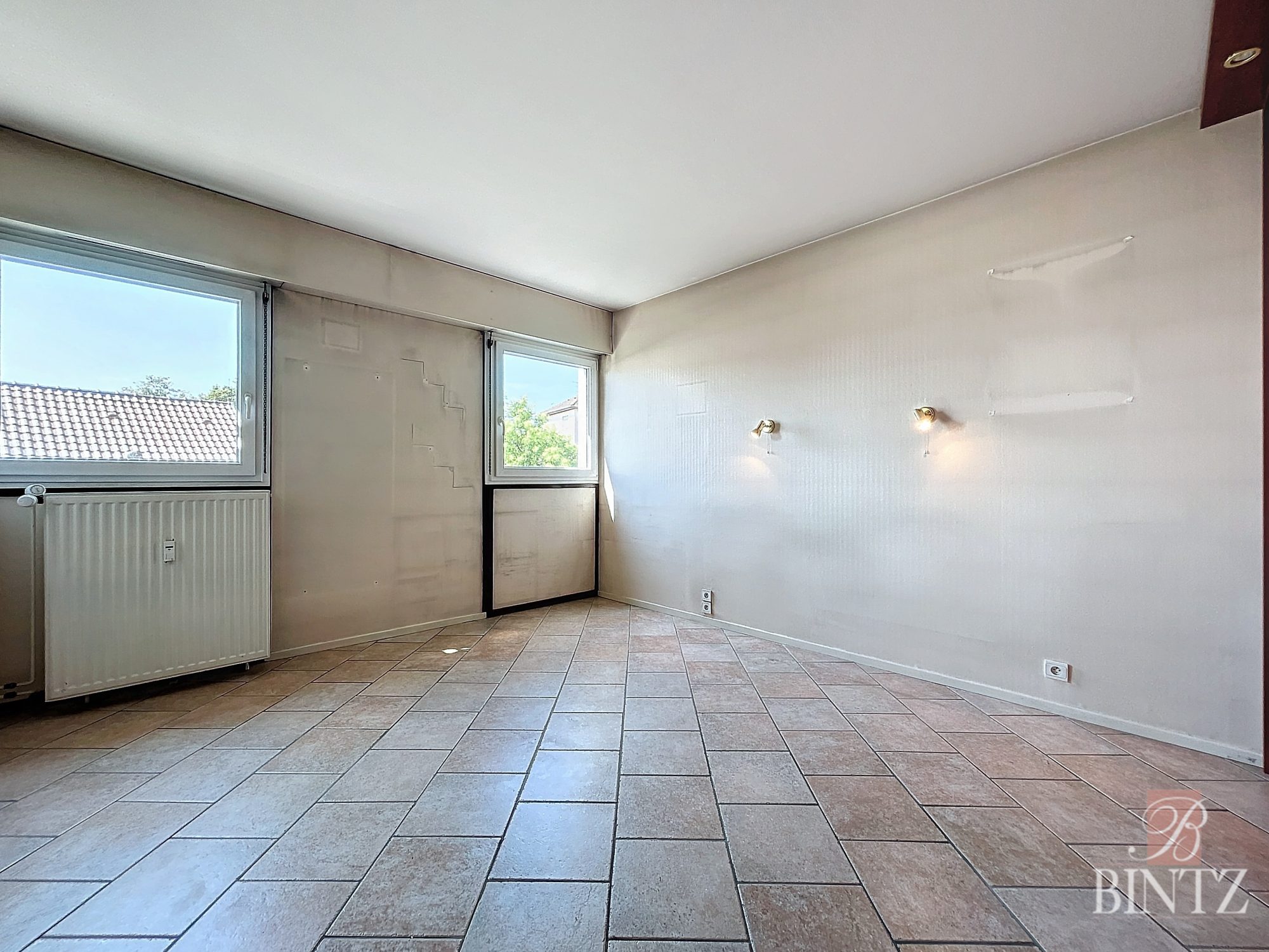 5 pièces de 123m2 avec balcon & garage - vente immobilière - Bintz Immobilier - 9