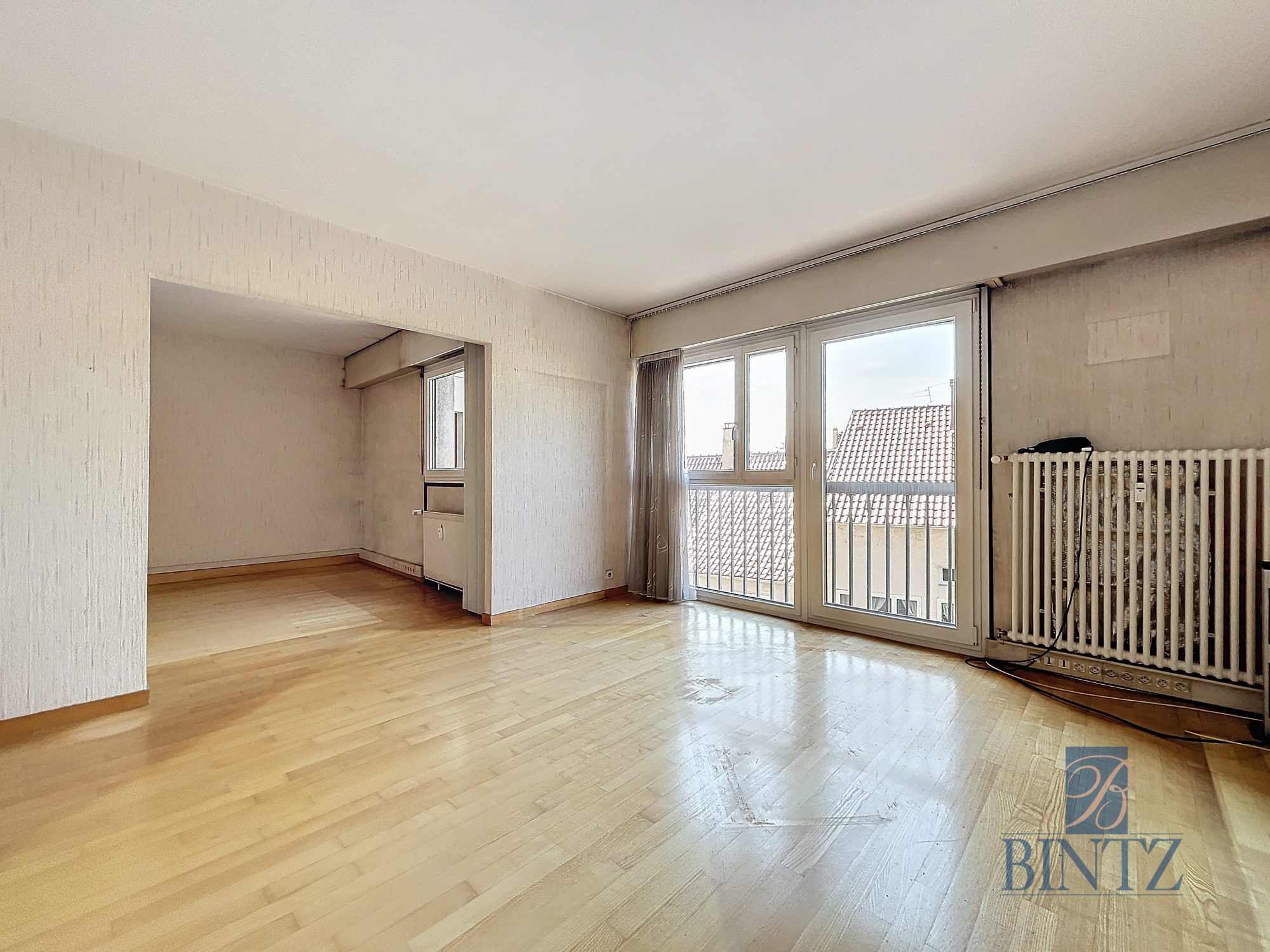 5 pièces de 123m2 avec balcon & garage - vente immobilière - Bintz Immobilier - 1