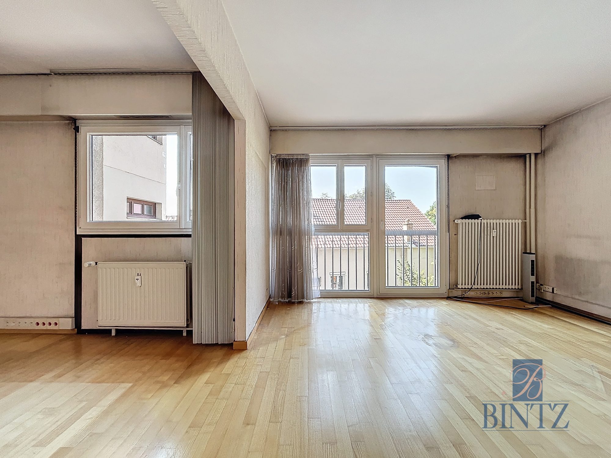 5 pièces de 123m2 avec balcon & garage - vente immobilière - Bintz Immobilier - 3