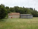 A large set of buildings for total renovation with three acres attached land.