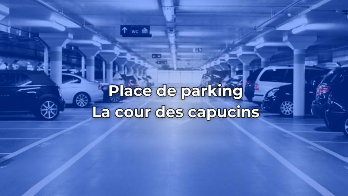 Place de parking PMR  dans le parking de la Cours des Capucins