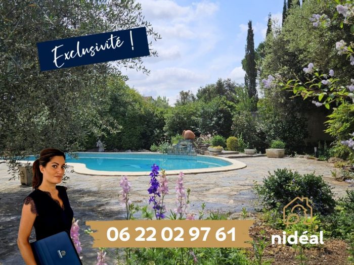 Photo Jolie villa dans un écrin de verdure avec piscine. image 1/33