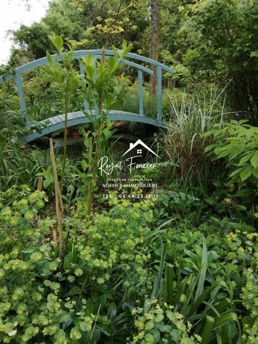Photo Fermette rénovée avec son jardin exceptionnel image 50/59