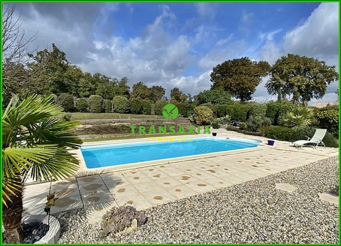 Photo Maison plain pied avec garage, jardin et piscine image 9/9